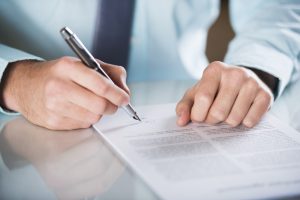 Business Law Solicitors writing a contract